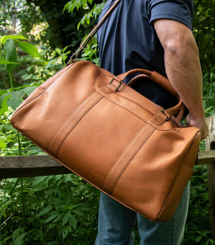 Large Leather duffle bag on shoulder