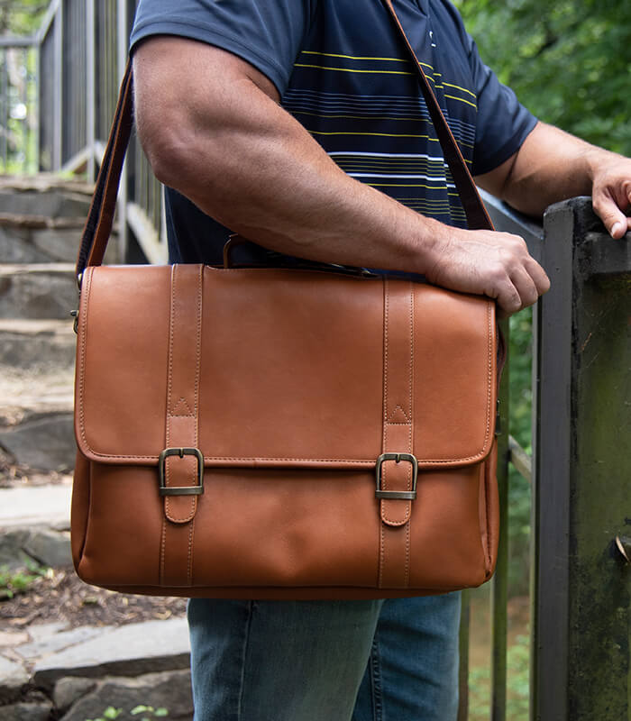 Leather messenger bag engraved with logo