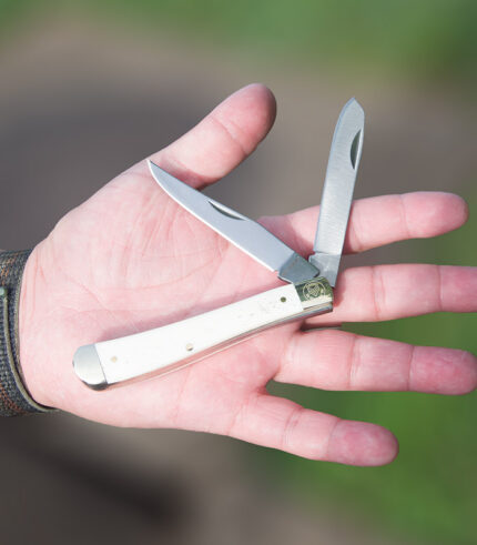 SK-227 White bone folder lifestyle in hand